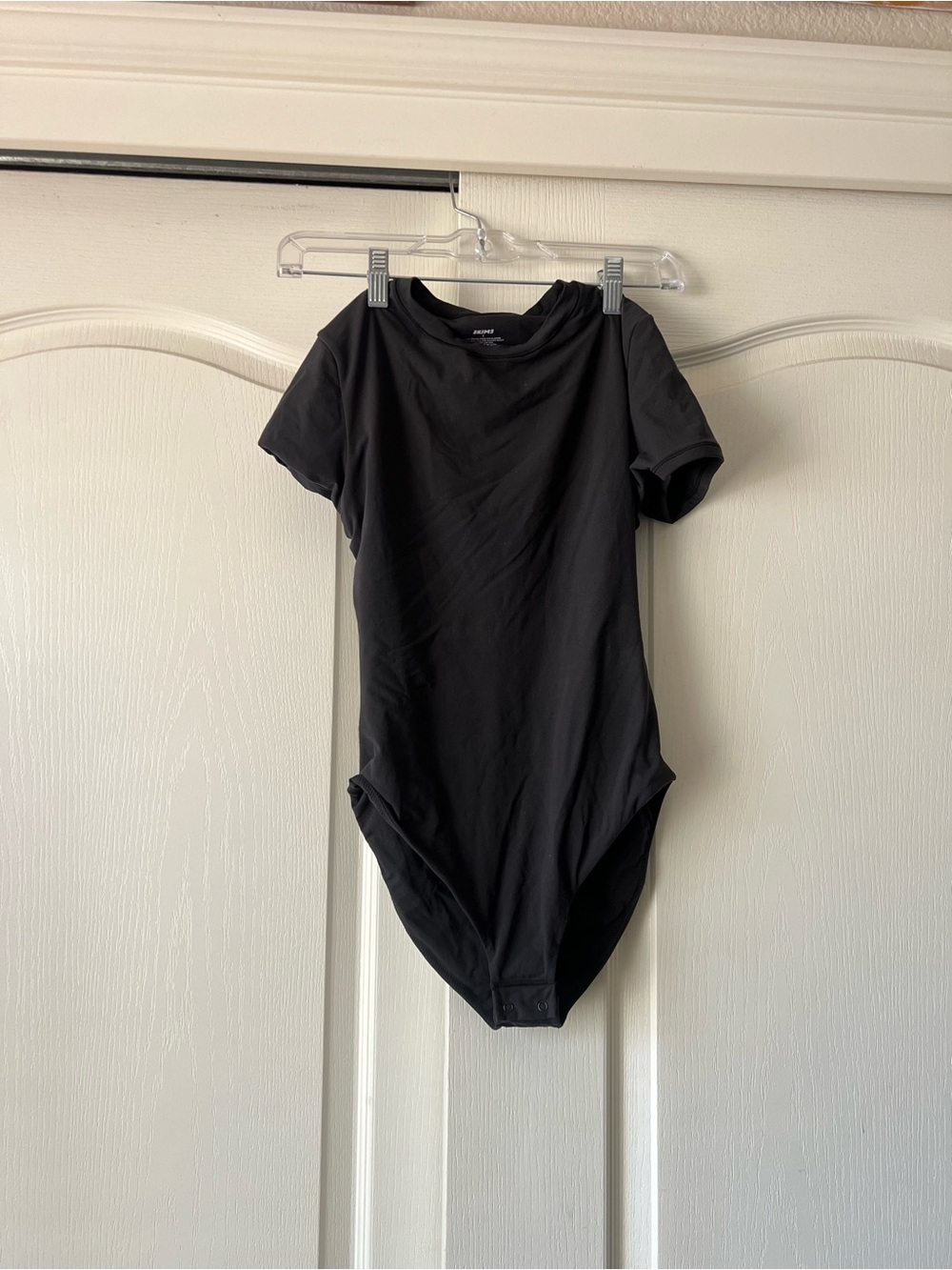 SKIMS Black Short Sleeve Bodysuit One-Piece